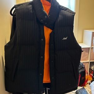KITH Fall 2022 reversible pinstripe puffer vest
